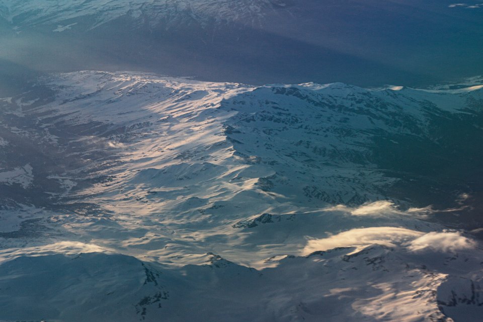 Alpine photograph, rendered by ScenePilot, with the selected effect visible to the right of the comparison slider